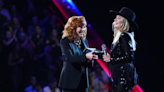 Watch Reba McEntire Surprise Lainey Wilson With Grand Ole Opry Invitation: 'Somebody Pinch Me' | iHeartCountry Radio
