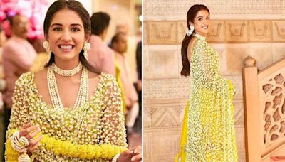 Rhea Kapoor shares photos of Radhika Merchant dazzling in yellow suit and flower-made dupatta at haldi ceremony