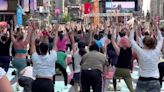 These Yogis Didn’t Let Heat Stop Their ‘Solstice in Times Square’ Tradition