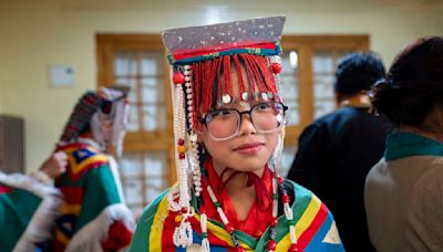 Hundreds of mostly exiled Tibetans celebrate the Dalai Lama's 89th birthday in India's Dharamshala