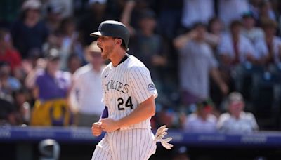 Rockies ride seven-run eighth inning to wild comeback win over Braves in series rubber match