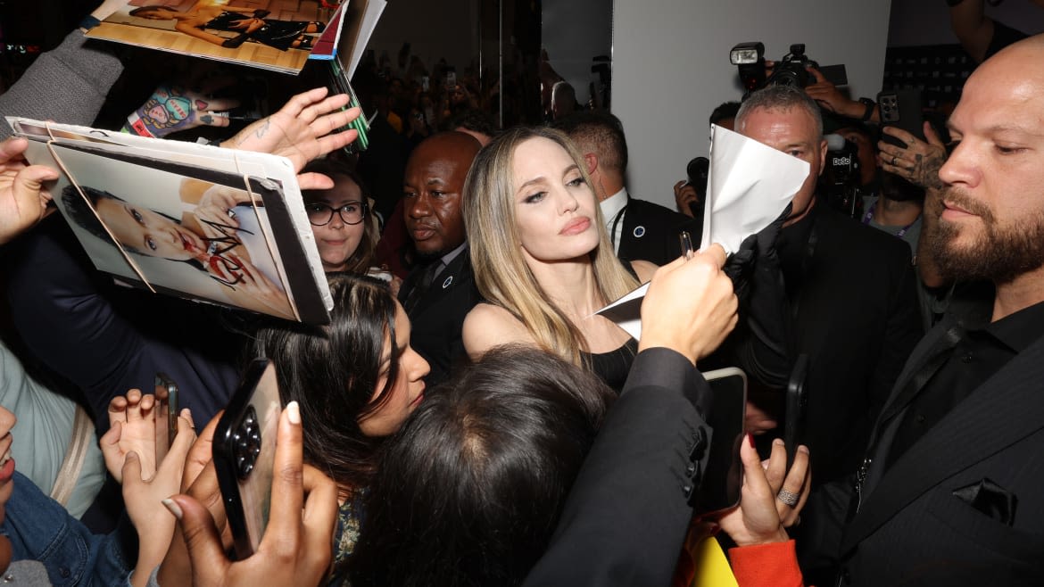 Angelina Jolie Nearly Knocked Down by Over-Eager Fan at Film Fest