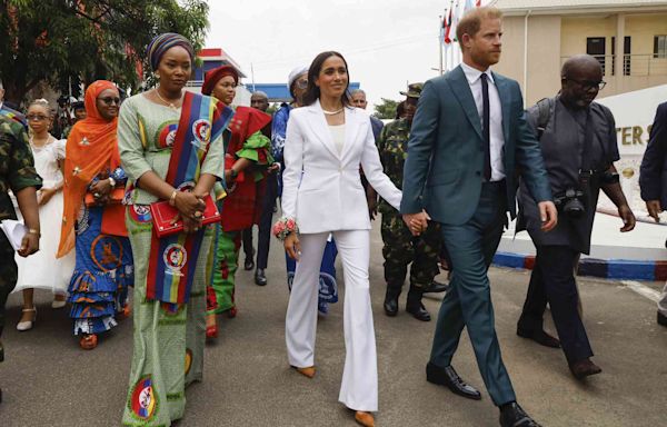 Meghan Markle Nails Business Chic in an All-White Suit on Her Nigerian Tour