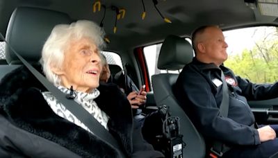 105-year-old celebrates birthday by riding along with firefighters, police
