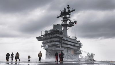 See aboard USS George Washington, an aircraft carrier with a checkered recent history