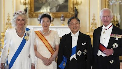 Queen wears the King Charles III Family Order for first time at state banquet