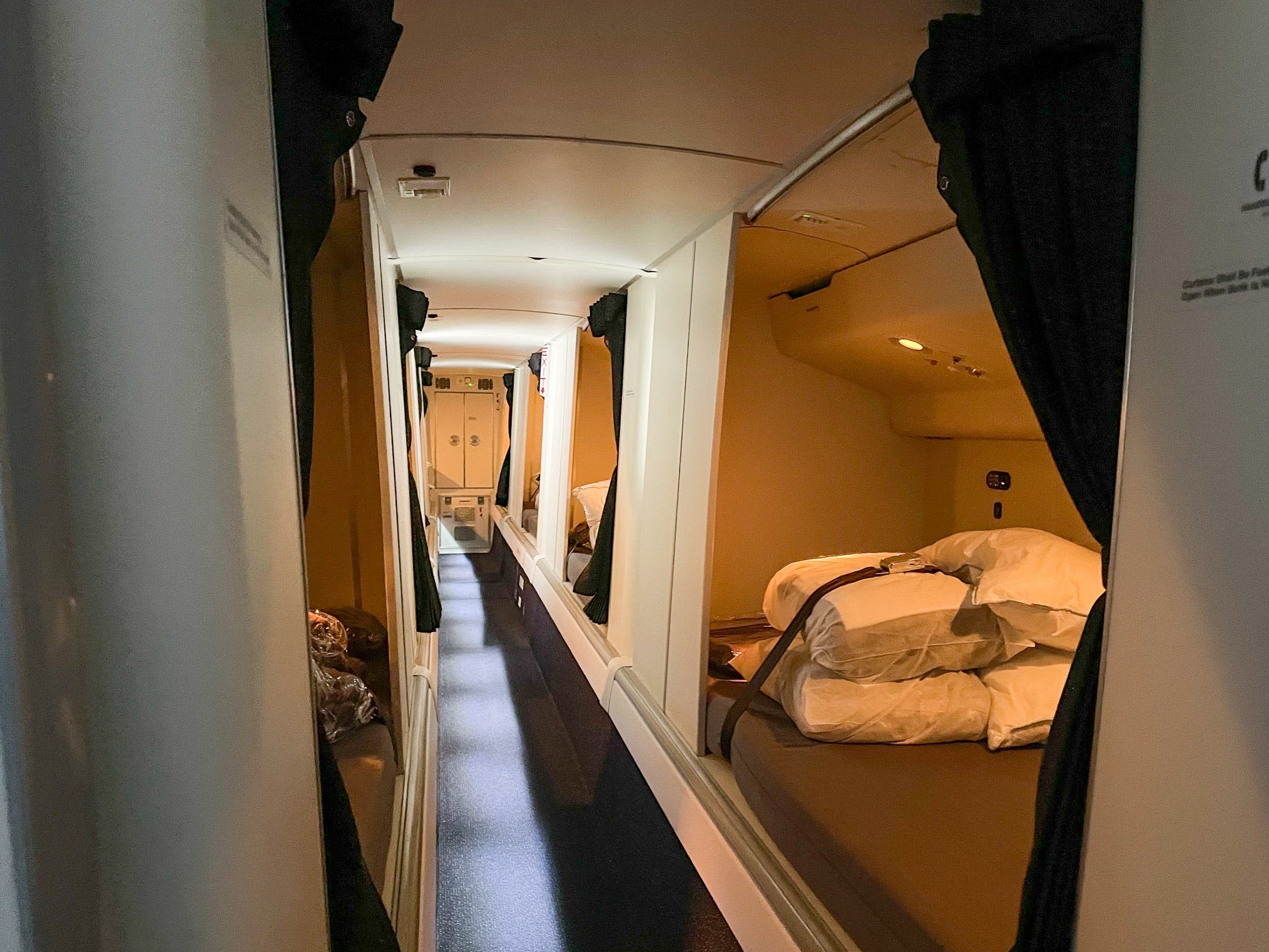 I went inside a hidden room where flight attendants sleep on long-haul flights. I was amazed by its small size and comfy beds.