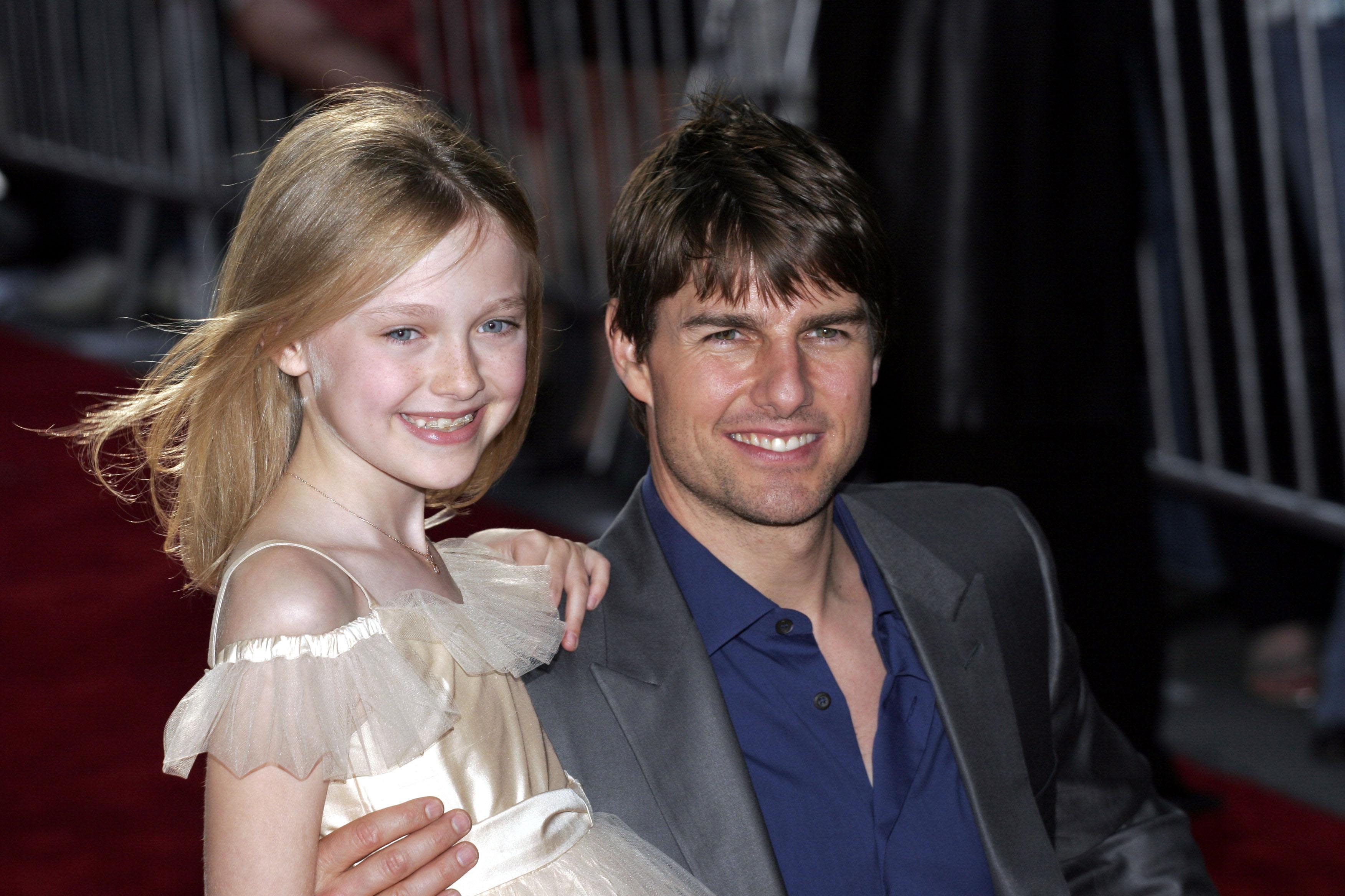 Dakota Fanning Reveals the Birthday Gift Tom Cruise Gives Her Every Year Since 2005’s ‘War of the Worlds’: ‘He Sends Me Shoes’