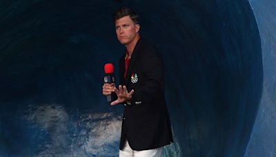 Colin Jost's run covering Olympic surfing in Tahiti comes to screeching halt after foot injury, infections