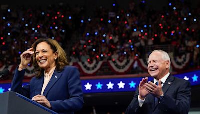 Kamala Harris and running mate Tim Walz take the stage at packed Philadelphia rally