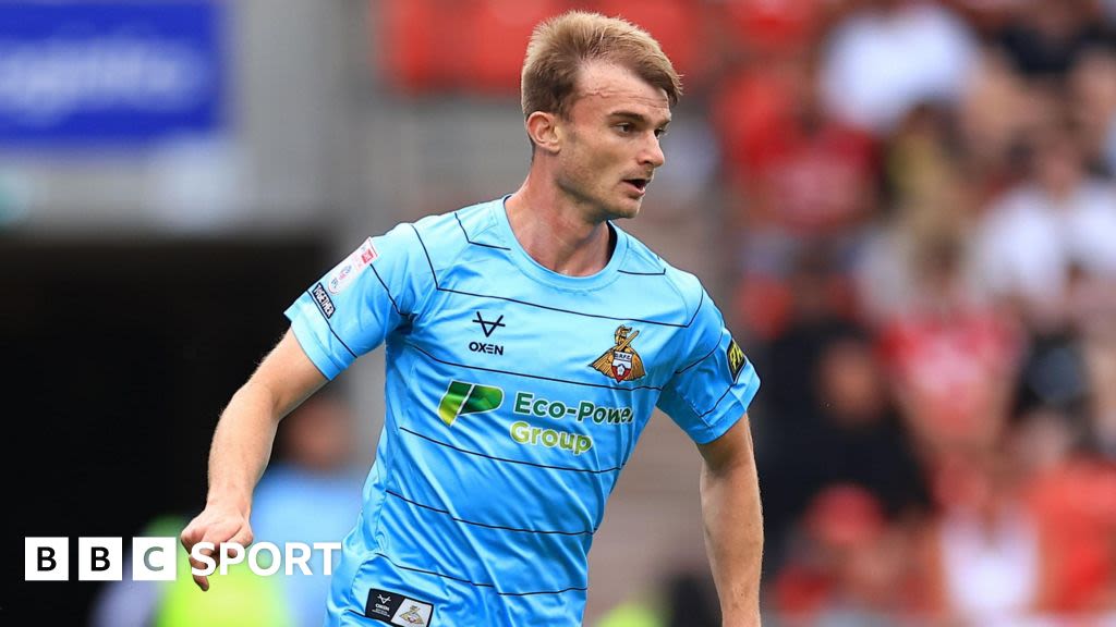 George Miller: Cheltenham sign striker from Doncaster