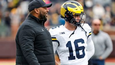 Michigan quarterbacks pushing each other in competition: 'Selfless pursuit of excellence'