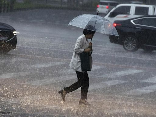 South Korea monsoon rains spur evacuations, disrupt flights