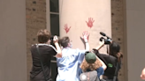 Pro-Palestinian protesters deface UNC's South Building with red paint, chalk