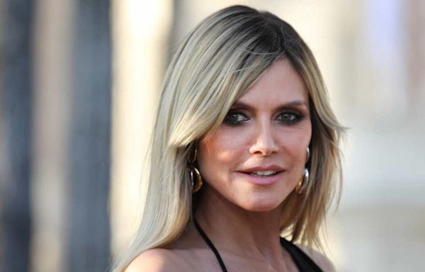 Heidi Klum Sunbathes in Shimmery Itty-Bitty Crochet Bikini