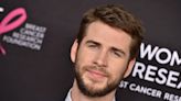 Liam Hemsworth Shares a Smooch With His Dog in Adorable New Photo