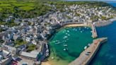 'Loveliest village in the UK' with sandy beach postcard'