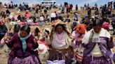 Water supply dwindling, Bolivians gather at dam to pray for rain