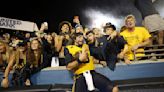 CJ Donaldson, Garrett Greene hurt in West Virginia's 17-6 win over Pittsburgh in 'Backyard Brawl'