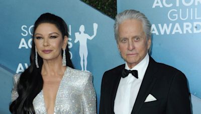 Michael Douglas & Catherine Zeta-Jones Reveal the Secret To Getting Their Adult Kids to ‘Actually Want To Hang...