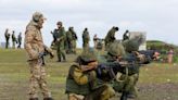 Gunmen kill 11 at Russian army base in new blow to Moscow's Ukraine campaign