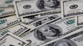 Dollar slumps ahead of US inflation data, sterling rises