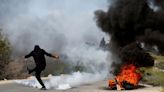 Israeli troops kill two Palestinian gunmen, suspected shooter, in West Bank