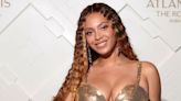 Beyoncé Is Absolutely Stunning in a Gold Armored Gown and Flowing Coat