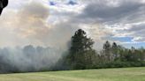 Crews respond to large outdoor fire off University Drive