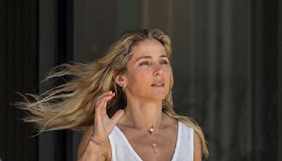 Elsa Pataky puts on a leggy display in an athletic white mini skirt