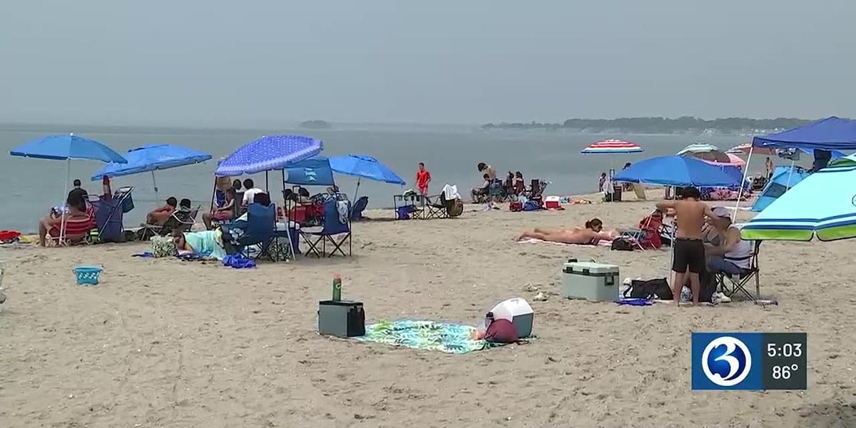 Beachgoers at Hammonasset State Park not deterred by gloomy start to day