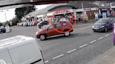 Moment police car smashes through supermarket in middle of emergency