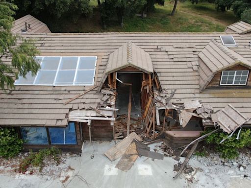 Kanye West's $2million dollar home strewn with rubble and gaping holes