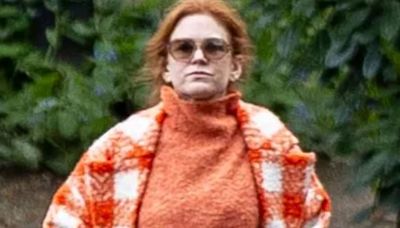 Stony-faced Isla Fisher goes for a stroll after split from Sacha Baron Cohen