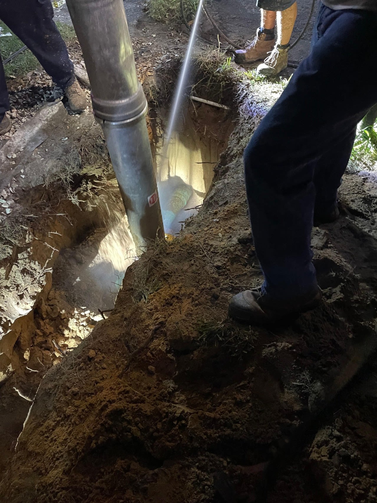 Dog gets trapped in wastewater cleanout pipe 8 feet under Polk County home