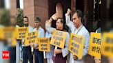 Aam Aadmi Party (AAP) MPs protest Delhi CM Arvind Kejriwal's arrest, boycott president's address in parliament | Delhi News - Times of India