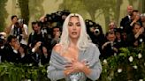 Fans are divided over Kim Kardashian’s Met Gala sweater. She explains why she wore it