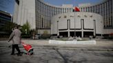 China central bank surprises by lending again at lower rates