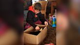 Surprise! Young boy has emotional reaction when he unboxes a furry new friend