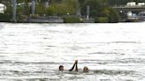 French sports minister takes a dip in the Seine ahead of Paris Olympics