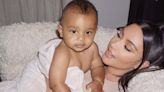 Psalm West, 4, looks grown up as he and mom Kim attend Saint's basketball game