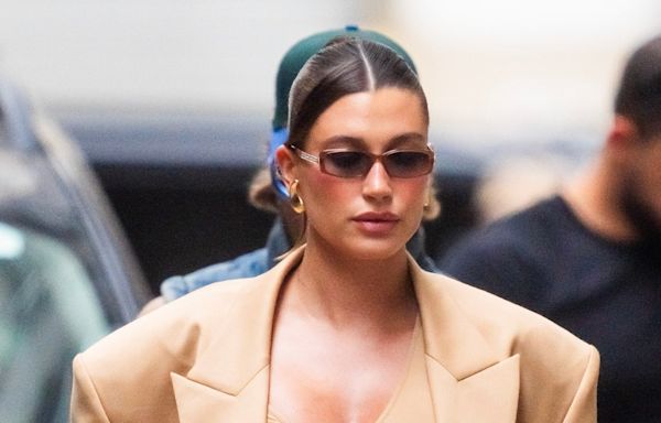 Hailey Bieber's '90s-Inspired Maternity Look Includes Overalls and a Crochet Hat