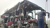 A double-decker bus collides with a milk truck in northern India, killing at least 18 people