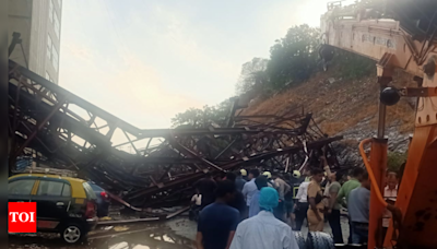 Metal parking tower, massive hoarding collapses amid gusty wind in Mumbai | India News - Times of India