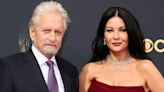 Michael Douglas & Catherine Zeta-Jones "Seduce" Their Kids With Trips