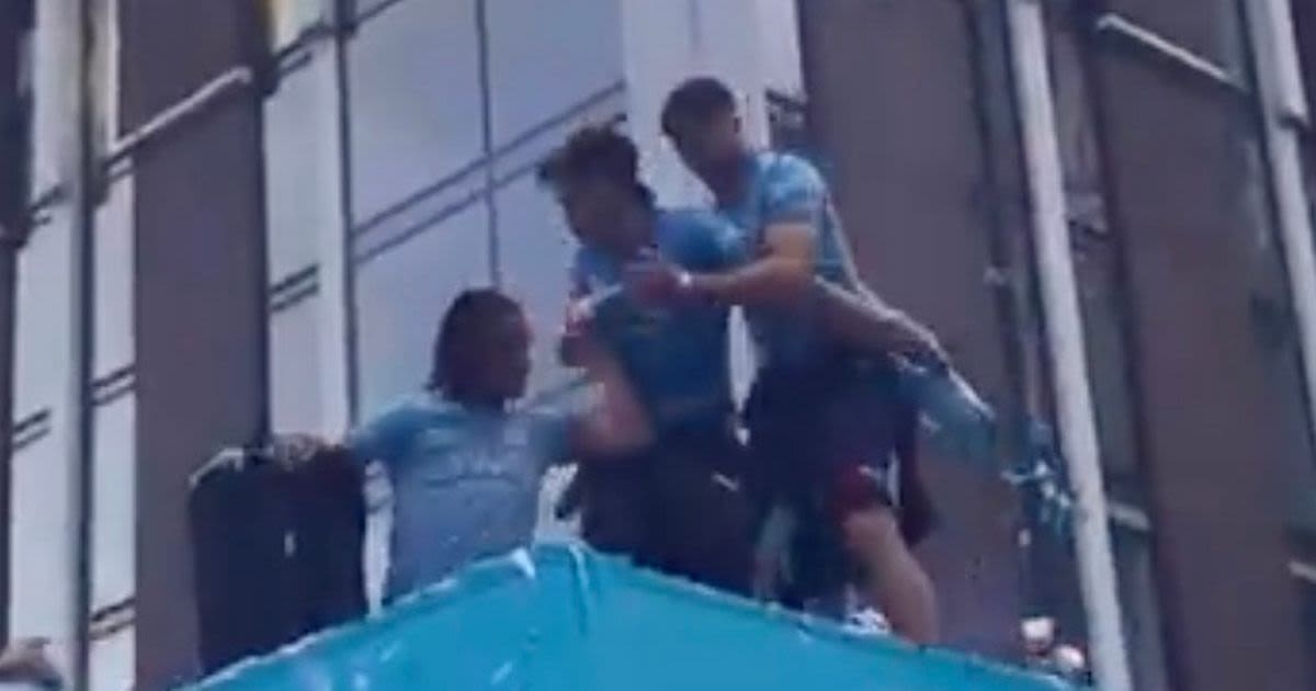 Jack Grealish almost falls off bus during Man City parade day after FA Cup loss
