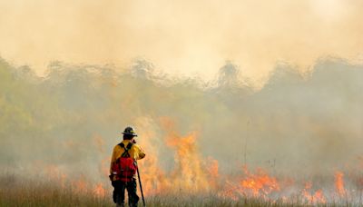 Thousands evacuate after massive fire threatens national park: 'Out of control'