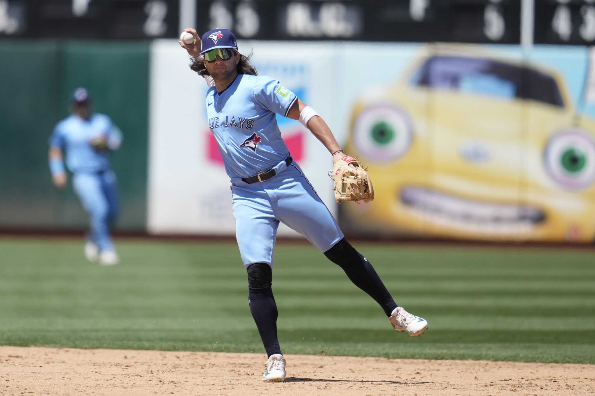 Blue Jays put SS Bo Bichette on IL with strained right calf, recall prospect Orelvis Martinez