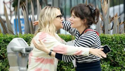 Kate Hudson runs into Zooey Deschanel while enjoying a walk in LA