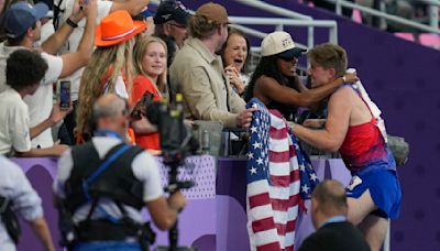 Hunter Woodhall, Tara Davis celebrate Utahn’s Paralympic gold the only way they know how